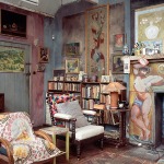 A photo of Charleston, a 17th century farmhouse that includes books, art and reading chairs