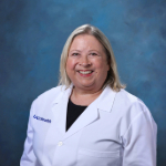 Headshot of Dr. Emily Blodget in white coat.